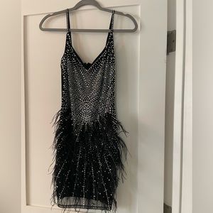 Stunning black pearl and feather dress! Fits beautifully